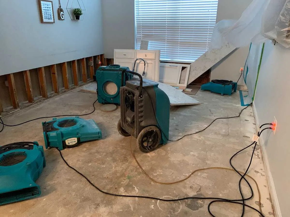 Dehumidifier in flood-cut room for Water Damage Restoration in Provo